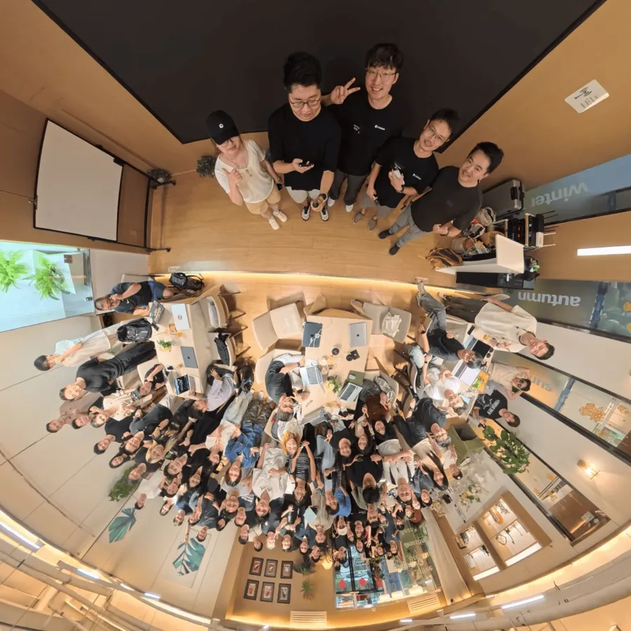 An overhead shot of a packed demo floor.